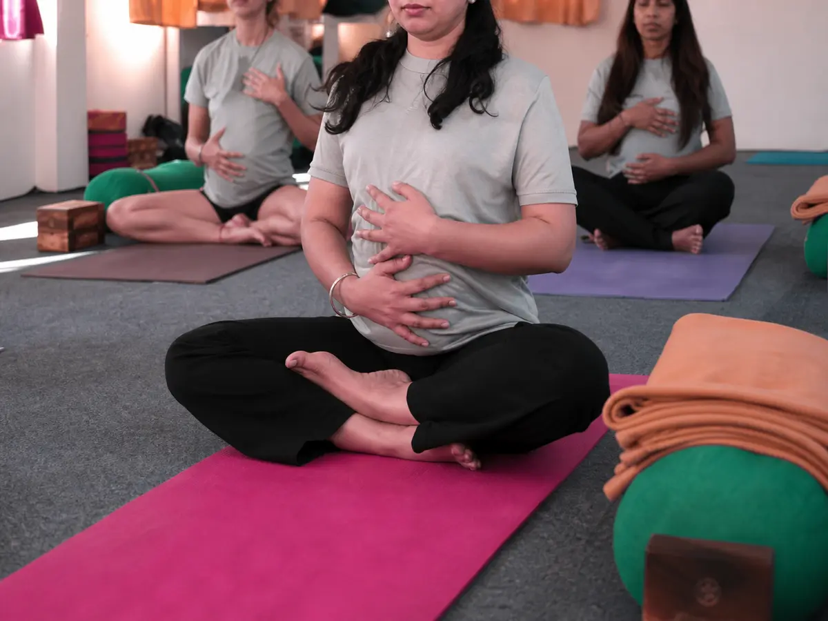 Guests taking part in breathwork and yoga